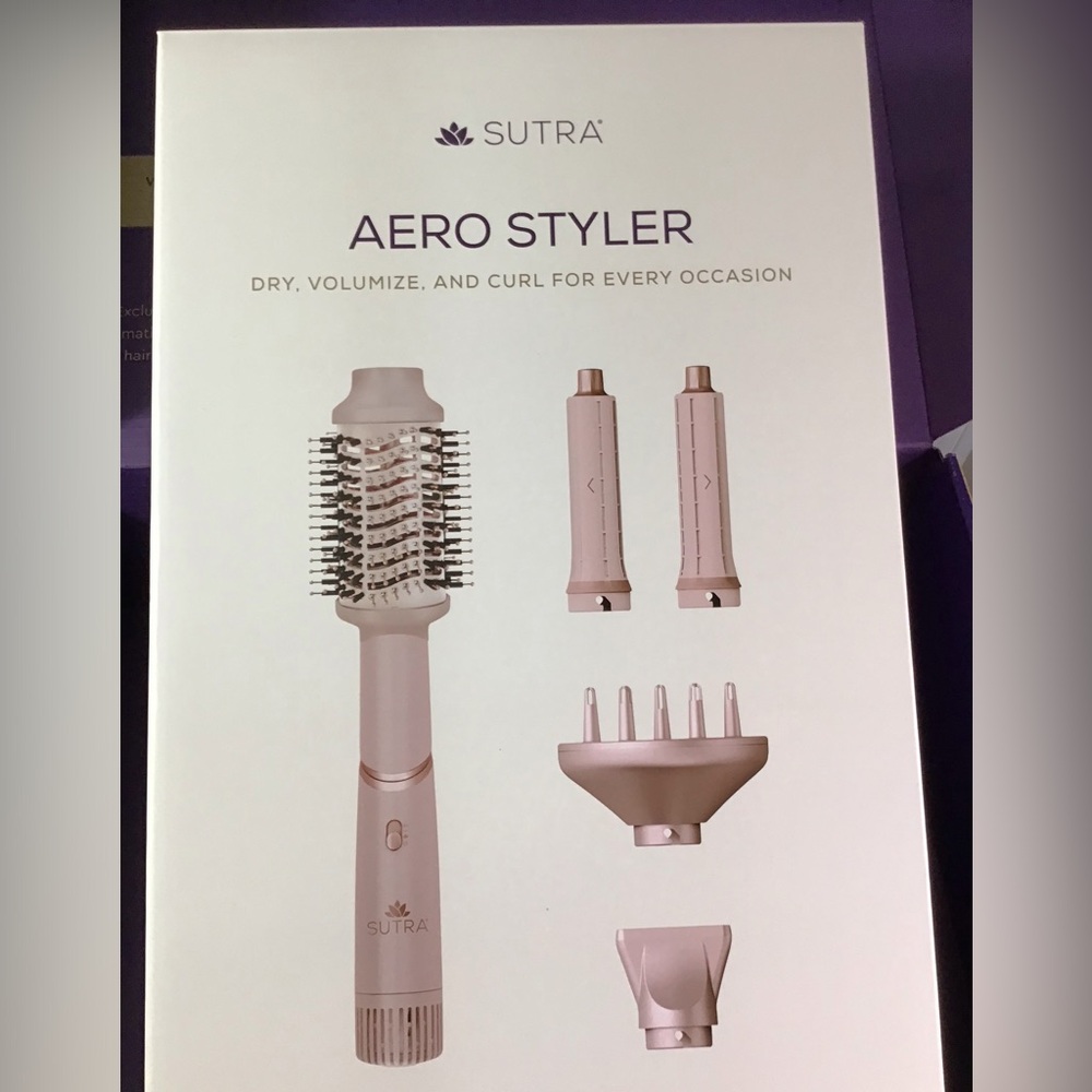 Pink Hair Styling Tool with Versatile Attachments